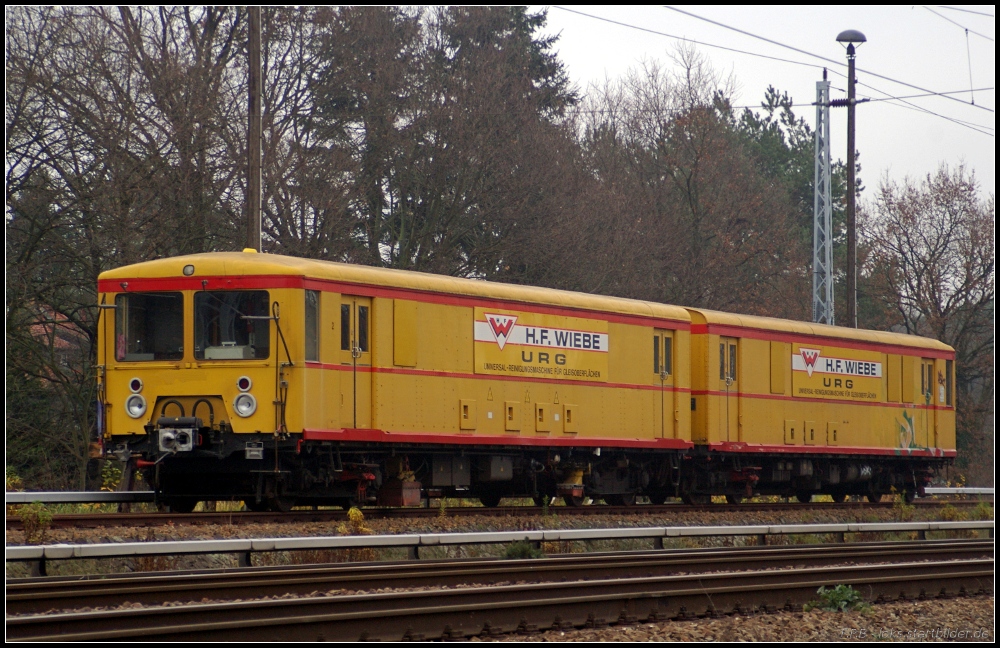 97 86 04 501-14 ist ein Umbau von 475 089/476 375 zur Universal-Reinigungsmaschine f�r Gleisfl�chen  URG  im Einsatz bei der Berliner S-Bahn (gesehen Berlin-Friedrichshagen 19.11.2010