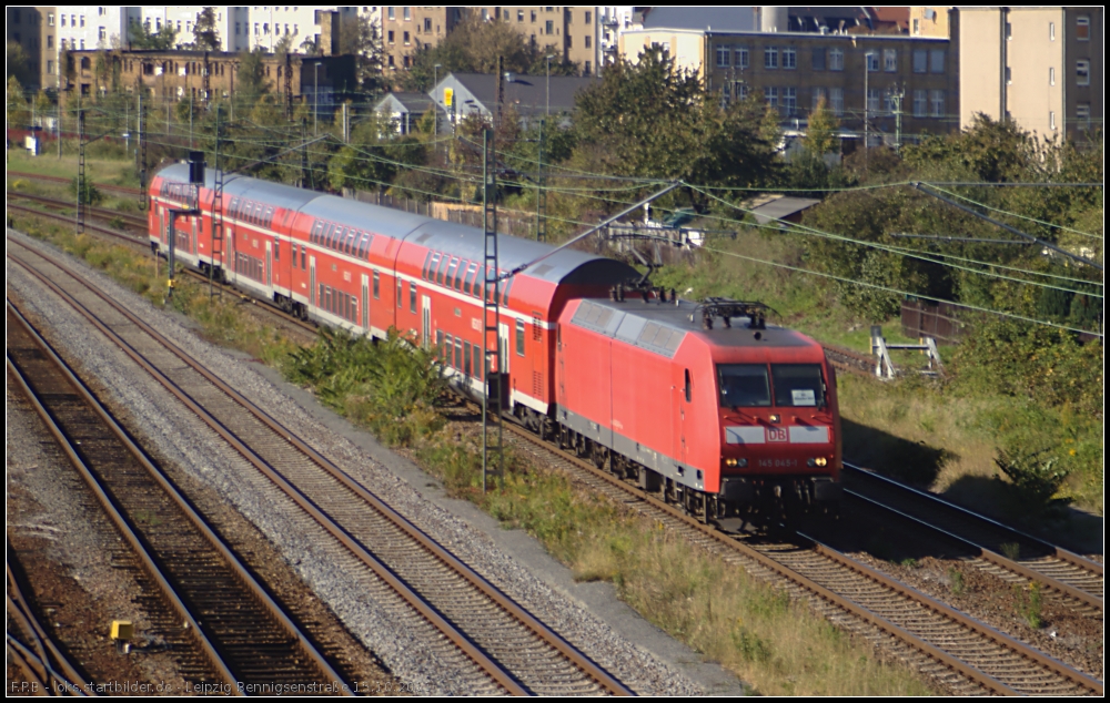 DB Schenker 145 045-7 im Einsatz mit einem Regio kurz nach der Abfahrt aus dem Leipziger Hauptbahnhof (gesehen Leipzig Kohlweg 15.10.2011)