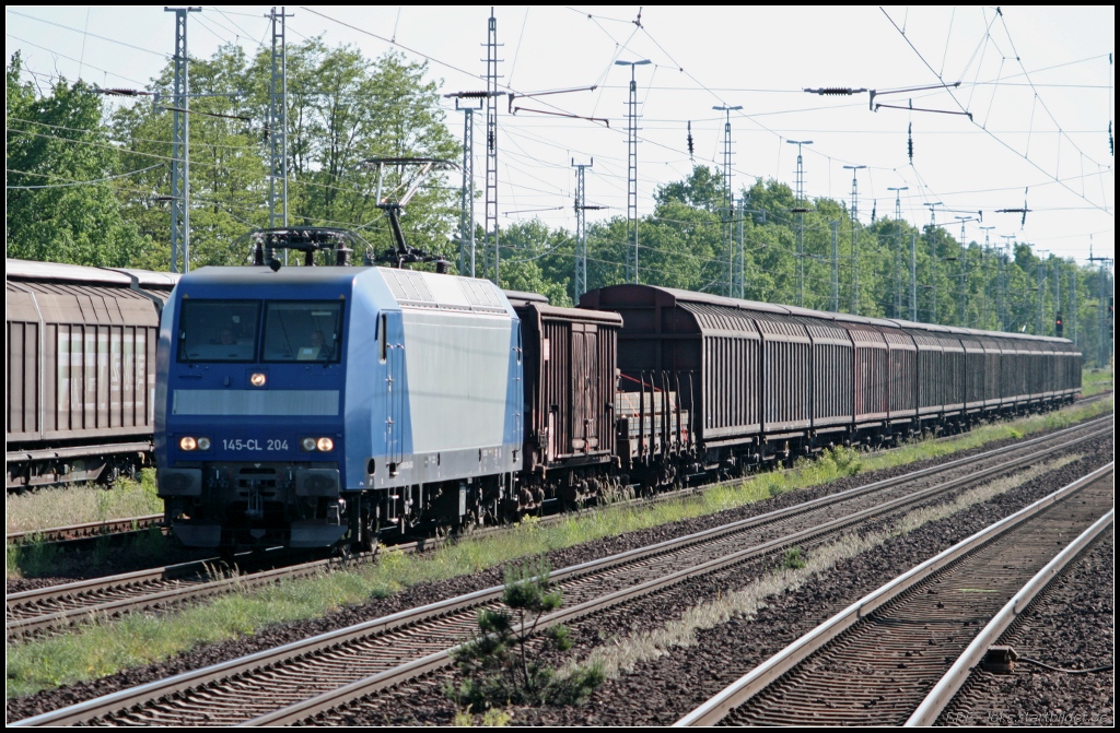 DB Schenker 145-CL 204 im Gegenlicht mit gemischten G�terzug (NVR-Nummer 9180 6145 100-4 D-ATLD, ex RBH 204, gemietet von Alpha Trains, gesehen Michendorf 03.06.2010)