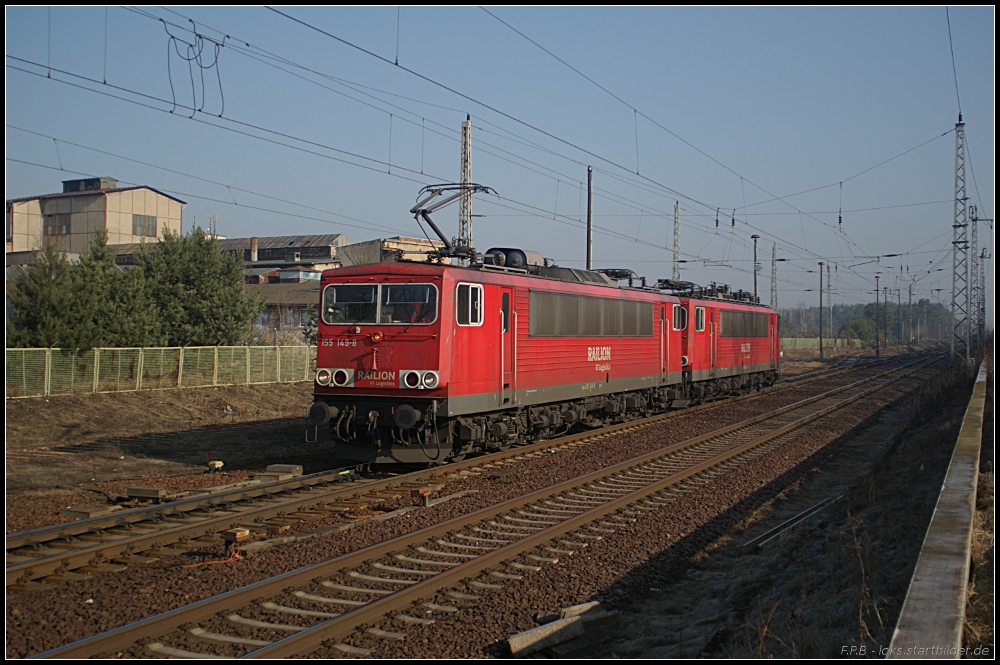 DB Schenker 155 149-8 und kalt 155 028-4 kommen bei schönstem Winterwetter durch Britz in der Uckermark gefahren (gesehen 26.02.2011)
<br><br>
Update: 155 149 am 20.07.2015 verschrottet in Opladen