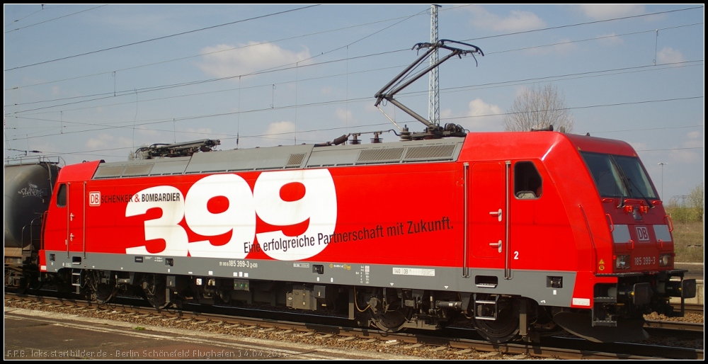DB Schenker 185 399-3  399  in Berlin Sch�nefeld, 14.04.2012. Gebaut wurde die Lok im Jahr 2010 und ist die letzte Lok aus der Serie TRAXX F140 AC2 an die G�tersparte der DB AG. Daher tr�gt sie auch den Sticker  399  und den Schriftzug  DB Schenker & Bombardier  (NVR-Nummer 91 80 6185 399-3 D-DB)
