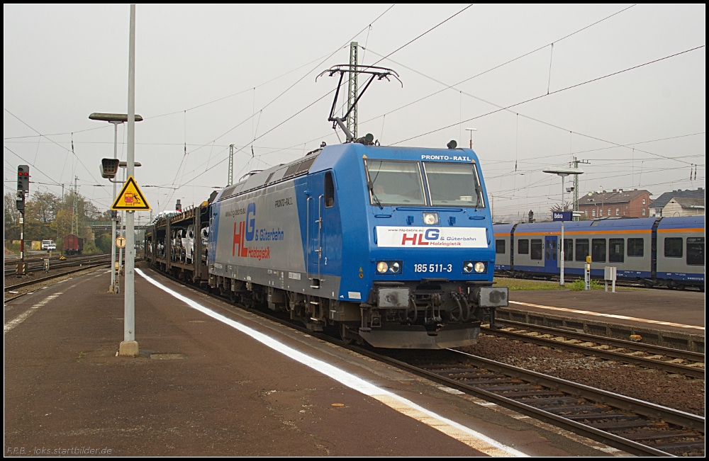 HLG 185 511-3 mit neuen Autos (Eigentum ATC, gesehen Bebra 14.10.2010)