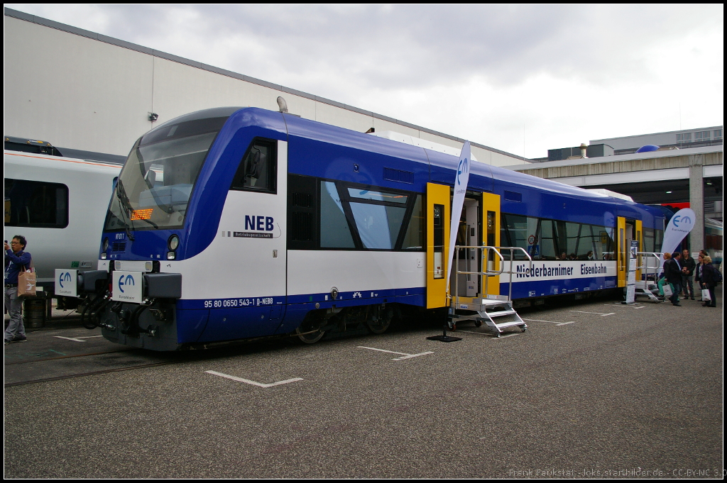 Im typischen blau-wei� der Niederbarnimer Eisenbahn pr�sentiert sich der modernisierte VT 011 / 650 543-1 auf der InnoTrans 2014 in Berlin (NVR-Nummer 95 80 0650 543-1 D-NEBB). Bei dem Triebwagen handelt es sich um den ehemaligen VT 011 der Mitteldeutschen Regiobahn