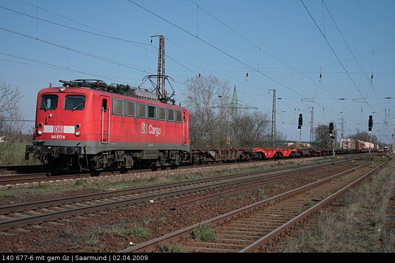 DB Schenker 140 677-6 und gemischtem G�terzug Richtung Seddin (Saarmund, 02.04.2009)
<br>
++ 15.11.2019 bei Bender, Opladen