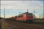 DB Schenker 155 148-0 und Sch�ttgutwagen am 25.11.2011 in Nuthetal-Saarmund