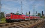 DB Regio 143 931-4 mit dem RE7 nach W�nsdorf-Waldstadt am 23.07.2012 in Berlin Sch�nefeld Flughafen