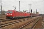 DB Schenker 185 348 mit einer Schwesterlok und einem Erzzug am 03.04.2013 in Berlin Sch�nefeld Flughafen
