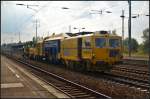 Plasser & Theurer UNIMAT 09-475/4S mit SSP 100 im Einsatz bei der Gleisbau-Busching-Wagner GmbH (GBW) am 07.09.2014 durch den Bahnhof Berlin Sch�nefeld Flughafen (NVR-Nummer 99 80 9424 003-8 D-GBW)